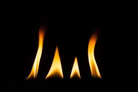 Blaze of fire isolated on black ground Stock Photos