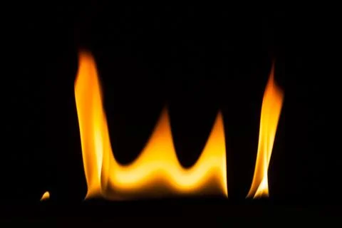 Blaze of fire isolated on black ground Stock Photos