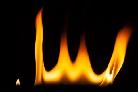 Blaze of fire isolated on black ground Stock Photos