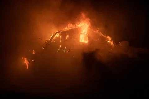 Blazing fire barn. Stock Photos