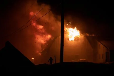 Blazing fire barn. Stock Photos
