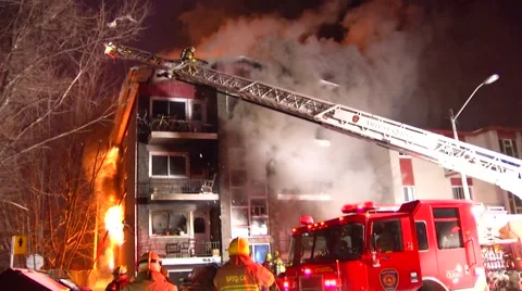 Blazing fire destroyed a building : firefighter need code red for evacuated crew Stock Footage 42852261
