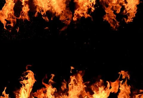 Blazing flames over black background イラスト素材