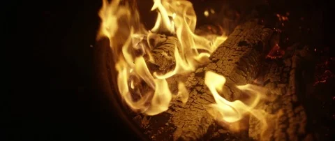 Blazing log fire in a wood burning stove Stock Footage 83823232