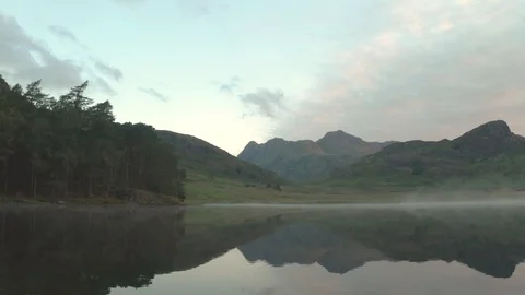 Blea Tarn in the Lake District during Sunrise Stock Footage 112610080