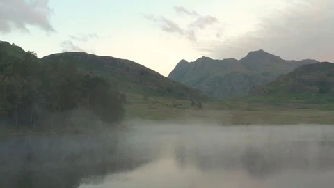 Blea Tarn in the Lake District during Sunrise Stock Footage 112610543