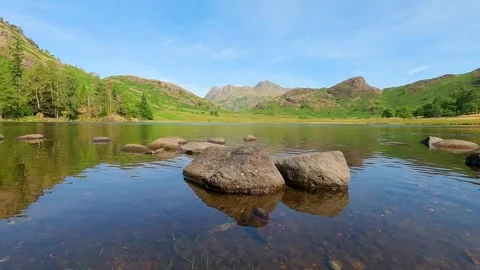Blea tarn timelapse with mountain view Stock Footage 346898987