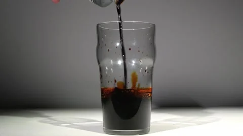 Bleach Clearing Iodine in Water During Simple Chemistry Experiment Stock Footage 324805109