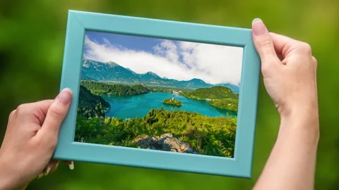 Bled lake in frame with moving clouds Stock Footage 134321527