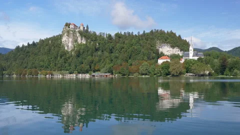 Bled lake landscape with view to the Castle of Bled and Church of Saint Martin Stock Footage 170839628