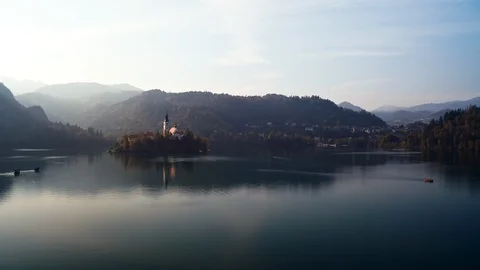Bled lake low flyby at sunset Stock Footage 119131504