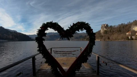 Bled sightseeing point heart decorated with Christmas decoration Stock Footage 123168206