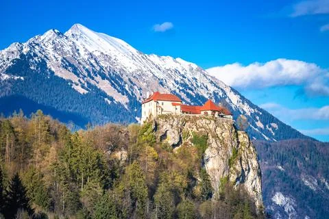 Bled, Slovenia. Bled castle on the rock with Julian Alps background Stock Photos