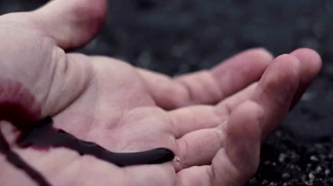 Bleeding Hand Left, Pre- Colorgraded Stock Footage 60619536