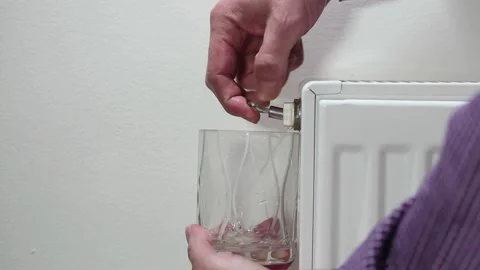 Bleeding the radiator Stock Footage 163946837