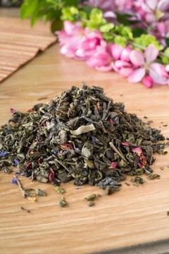 Blend of green tea on a table with colours3. Stock Photos