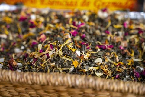 Blended black leaf dry tea with aromatic flowers, spices in tea shop in Andal Stock Photos