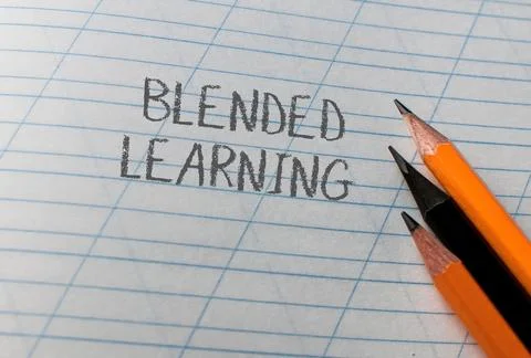 Blended learning is a concept that involves combining different teaching methods Stock Photos