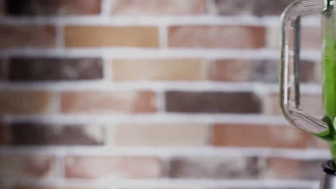 Blender with green smoothie on the kitchen Stock Footage 80855332