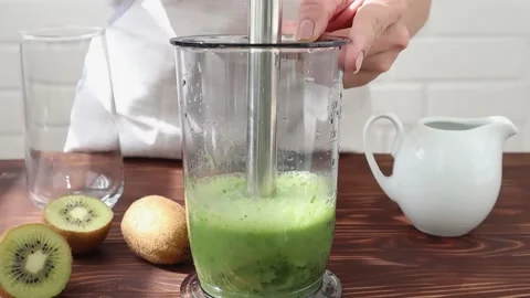 Blender grinding of spinach, smoothies with vegetable milk. Stock-Footage 202175636