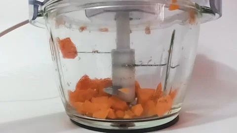 Blender grinds carrots Stock Footage 197792532