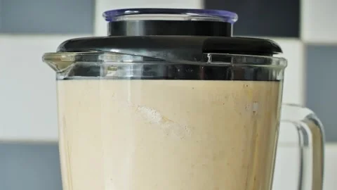 Blender Mixing Eggs Flour and Milk – Slow Zoom Kitchen Scene Close Up Stock-Footage 321516697