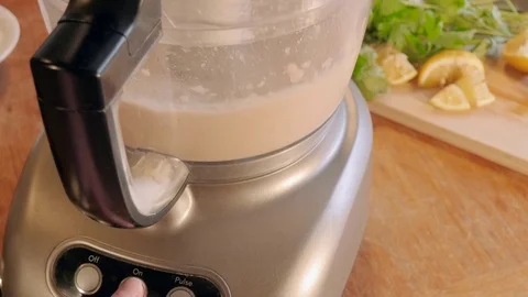 Blending Beans into a Party Appetizer Dip Stock Footage 78518170