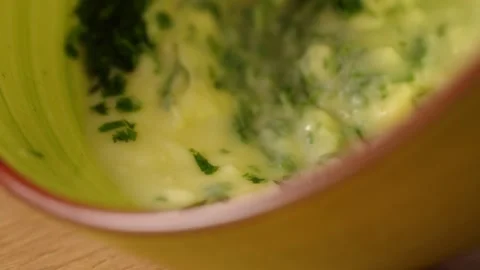 Blending Chopped Parsley into Butter. Stock Footage 258651507