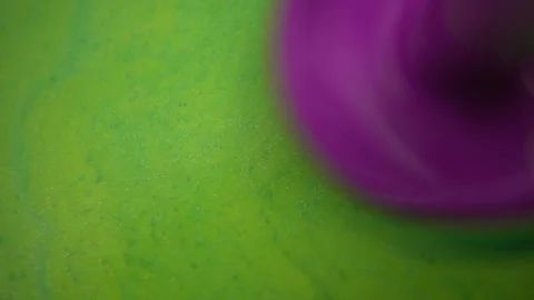 Blending Colored Liquid Paints Stock Footage 94360167