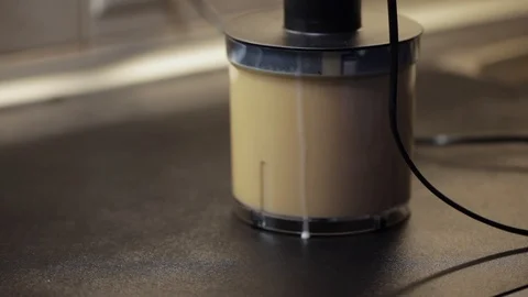 Blending squash cake mix Stock Footage 97410964