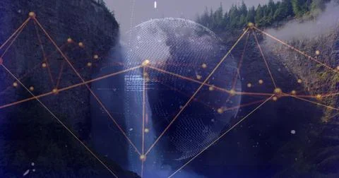 Blending waterfall and dotted globe, forming misty forested canyon with Stock Photos