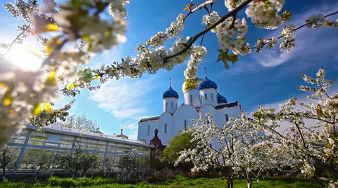 Blessed place, church in background, spring garden Stock Footage 37864824