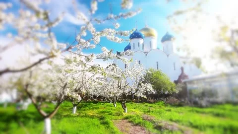 Blessed place, church in background, spring garden Stock Footage 181459003