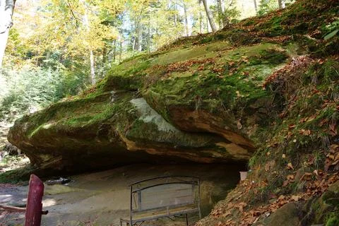Blessed Stone and sacred spring in forest near Manyava Skete in Ukraine 库存照片