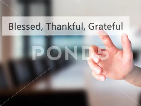 Blessed Thankful Grateful - Hand pressing a button on blurred ba Stock Photos
