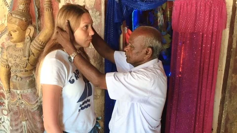 Blessing by a Buddhist temple minister Stock Footage 74332464