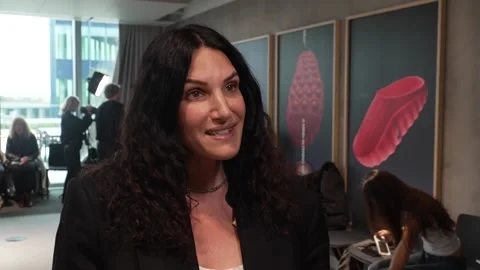 Blind and low-vision guests have 'touch tour' of clothes at London Fashion Week Stock Footage 329388302