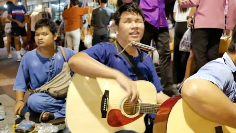 Blind band playing instruments ,singing song for donation Stock Footage 141505275