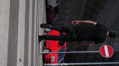 Blind man with cane navigating pedestrian crossing Stock Footage 299938731