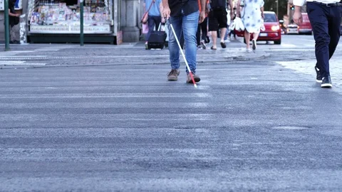 Blind Man with cane. Visually Impaired Person  Crossing Street Stock Footage 86159872