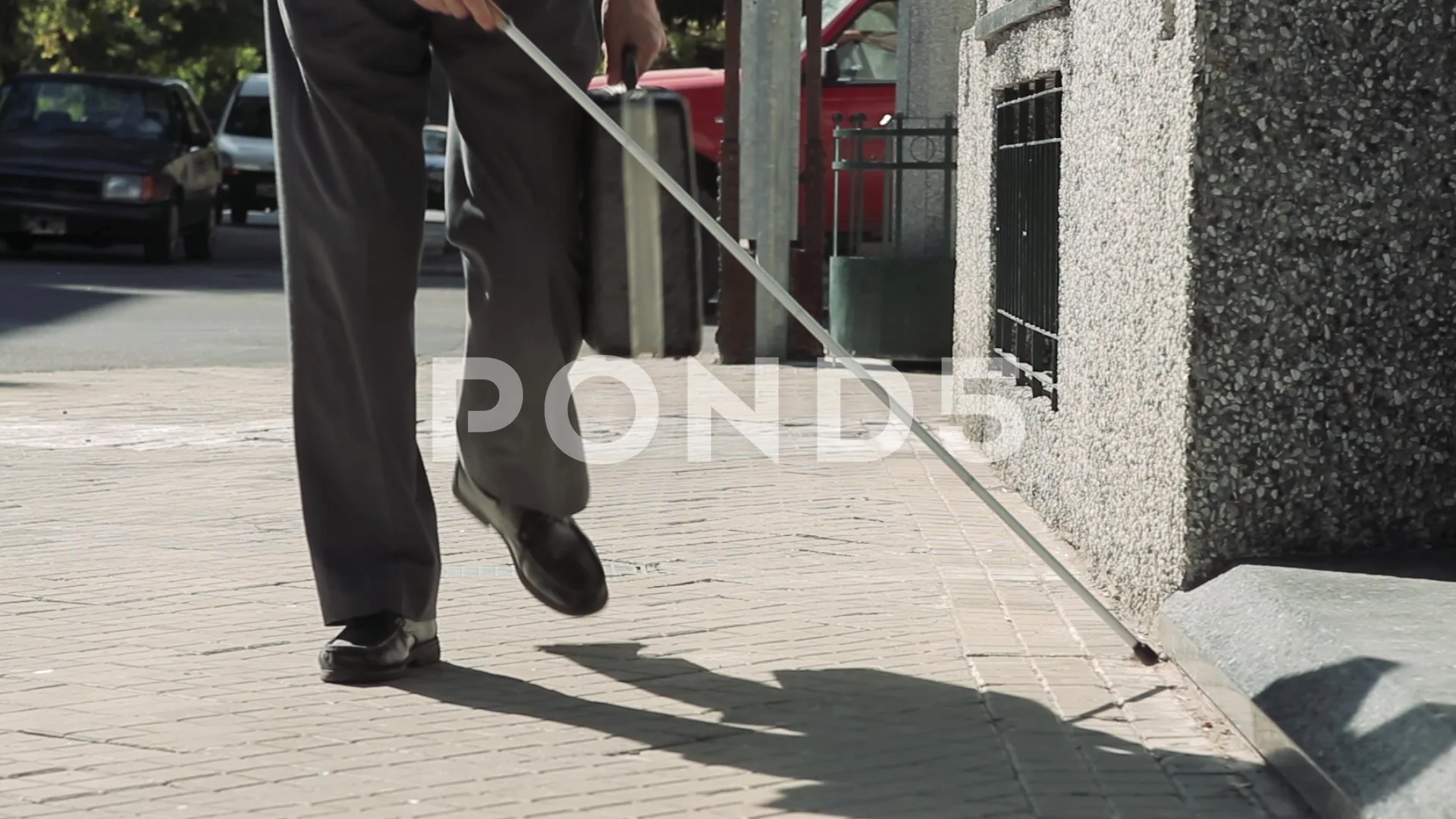 Blind Man with Cane Walking on A Sidewal, Stock Video