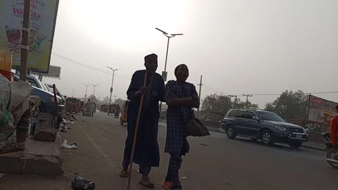 Blind Man With Guide Walking Roadside Kano Nigeria Stock Footage 330547510
