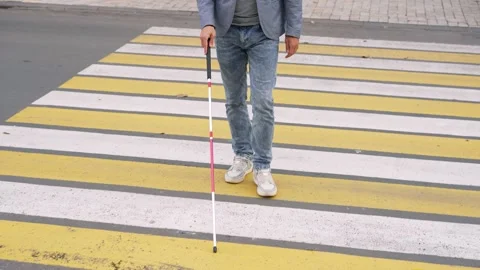 Blind Man Navigating a Pedestrian Crossing with Confidence Stock Footage 290910180