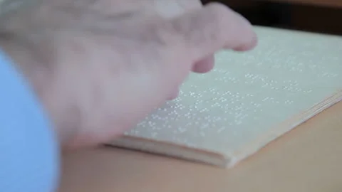 Blind man reading braille 9 Stock Footage 268283243