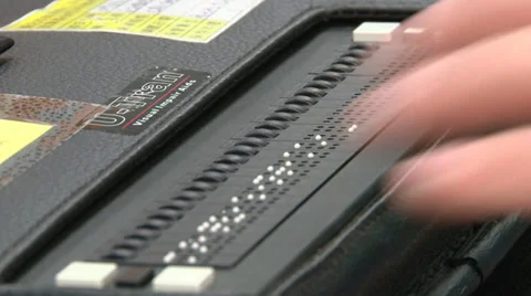 Blind man writing in a special computer Vídeos de archivo 36424948