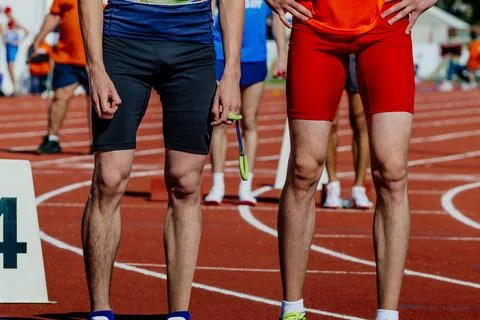 Blind para athlete runner with guide in starting line sprint race Stock Photos