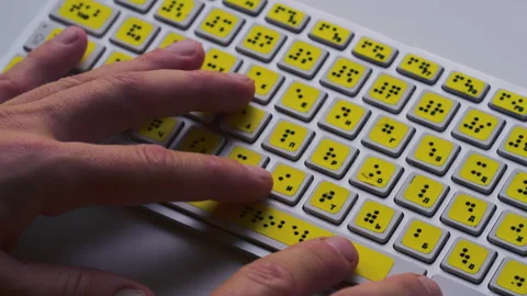 Blind person man hands using computer braille keyboard or terminal a technology Stock Footage 319746419