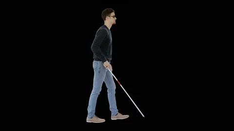 Blind young man with a cane walking, Alpha Channel Stock-Footage 130640875