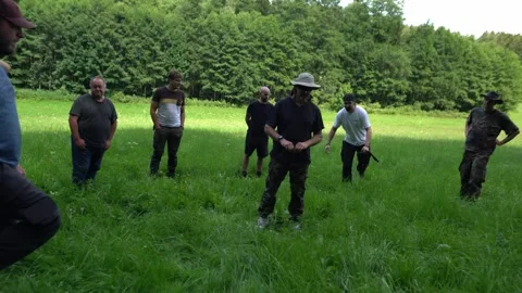 Blindfold team building game focused on listening skills, sound localization Stock Footage 331061654