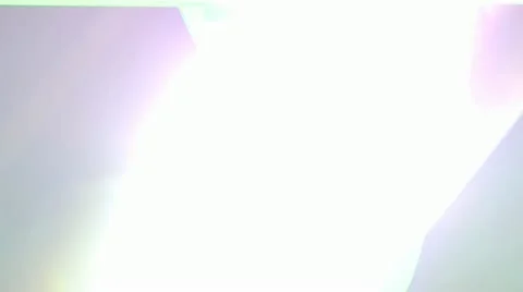 Blinding Sunlight Peering Through Two Solar Panels 2 Video stock 19139550